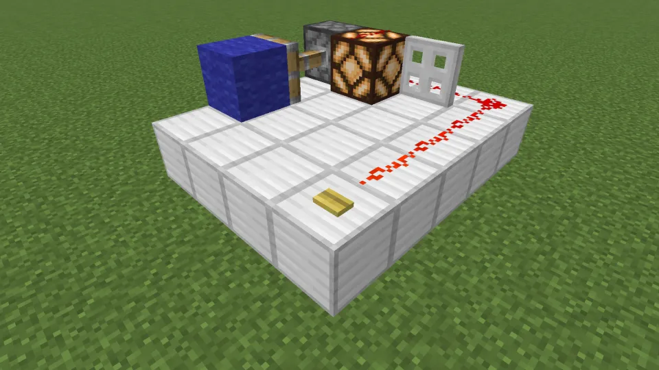 竹のボタンでレッドストーン信号を発信する様子