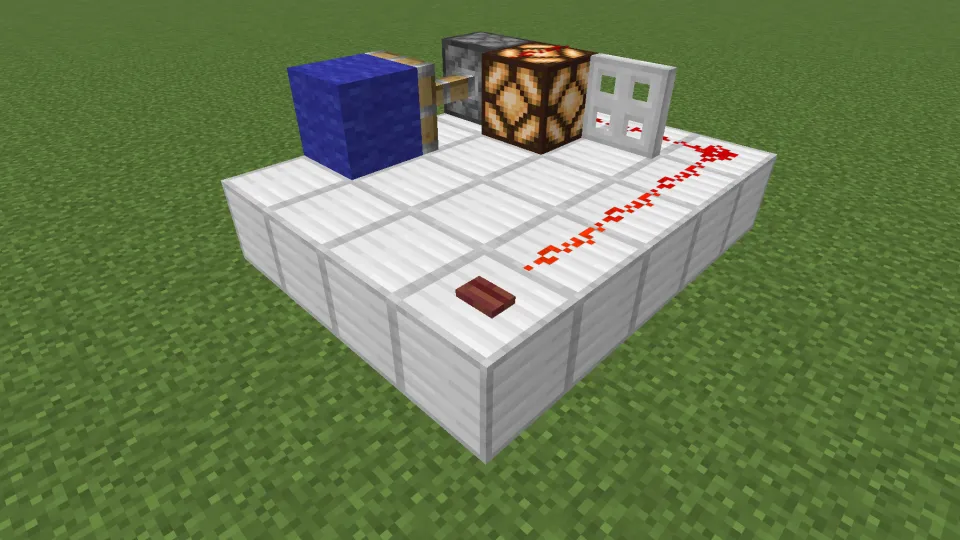 マングローブのボタンでレッドストーン信号を発信する様子