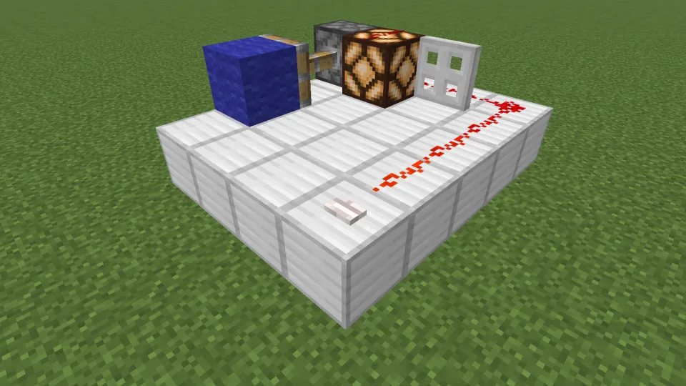 ペールオークのボタンでレッドストーン信号を発信する様子